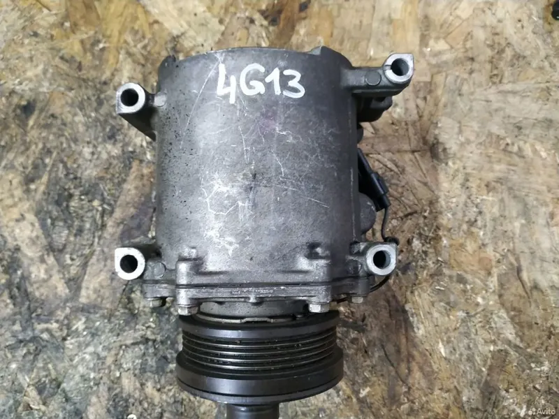 Фото: Компрессор кондиционера Mitsubishi Mirage Dingo CQ1A 1998-2002